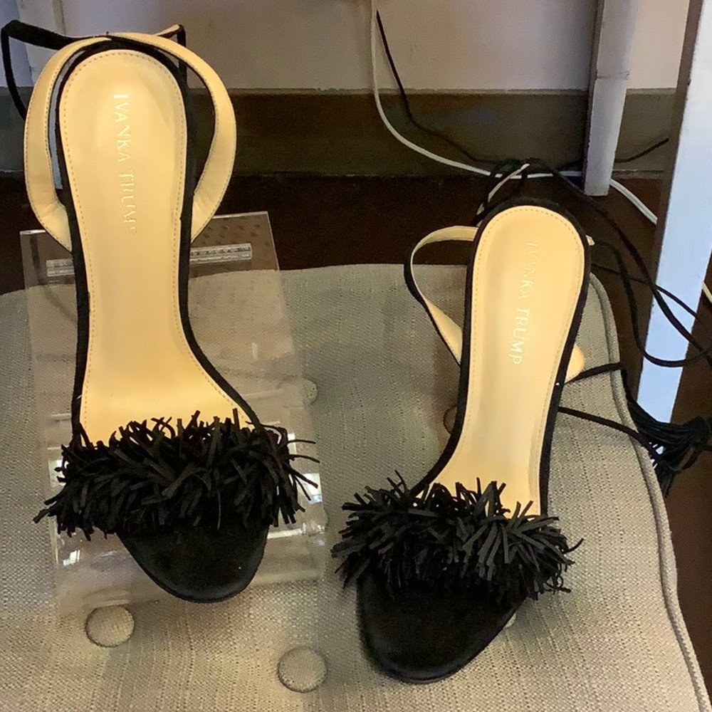 Black heels with lace up design by Ivanka Trump